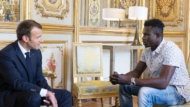 French President Macron and Mamoudou Gassama